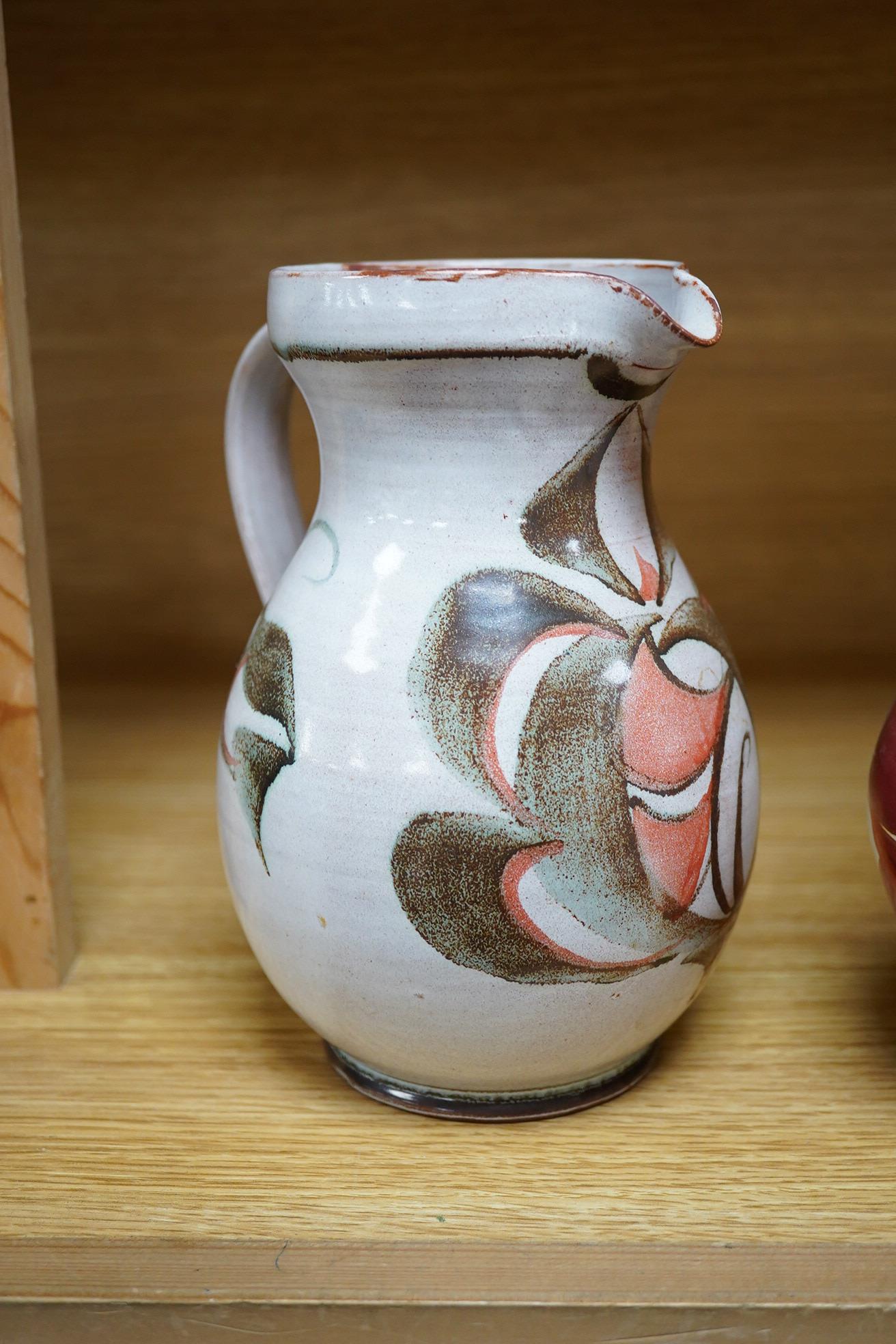 Alan Caiger-Smith (1930-2020), an Aldermaston Pottery lustre glazed jug and another, tallest 22cm. Condition - good